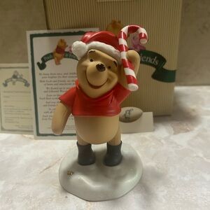 Holiday Winnie the Pooh Figurine with Santa Hat and Candy Cane